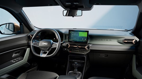 Unutrašnjost vozila Dacia Bigster s upravljačem, digitalnim zaslonom i središnjom konzolom prikazanom iz perspektive vozača.
