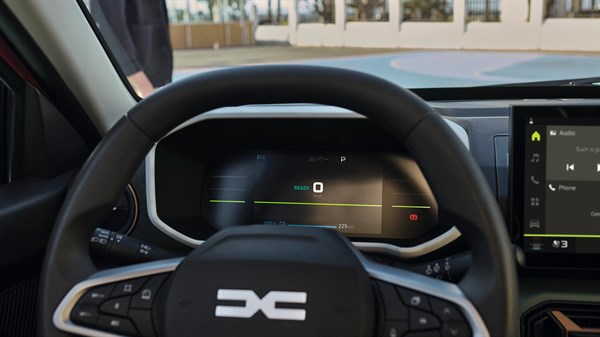 Prikaz instrumentne ploče vozila Dacia s prikazom dosega