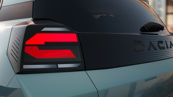 Detalj stražnjeg LED svjetlosnog potpisa vozila Dacia Spring.